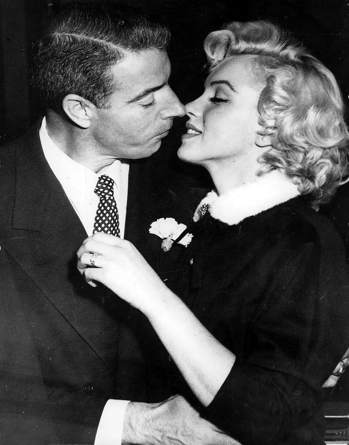 Marilyn Monroe and Joe DiMaggio at San Francisco City Hall, January 14, 1954.